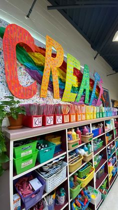 there is a large sign that says craft on the wall in front of children's toys