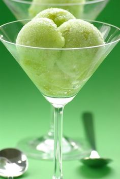 two martini glasses filled with ice cream