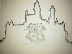 a drawing of hogwarts castle on the wall