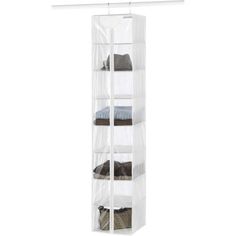 a white hanging closet with four shelves and three folded towels on the bottom shelf,