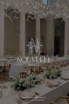 the nouvelle wedding website is displayed in front of an elegant room with chandeliers