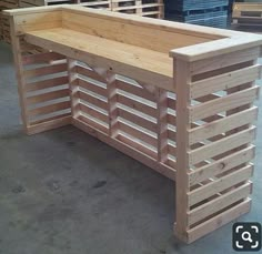 a bench made out of wooden slats