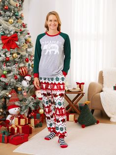 Upgrade your family pajama game with our matching outfits! Our Christmas themed sleepwear features raglan sleeves and adorable polar bear graphics with MAMA Bear, PAPA Bear or BABY Bear text. Dogs are included with their own bandana.
* Please add each size separately to your shopping cart.
* Piece of product: Each size includes 1 set of pajamas (1 top + 1 bottom), or 1 romper, or 1 pet Bandana 
* For children's safety, pajamas should be snug-fitting or flame-resistant. These kids' and babies' pajamas are flame-resistant.
* Product features: Matching family pajamas
* Fabric characteristics: Soft and comfortable
* Neckline: Round
* Sleeves: Long
* Pattern: Christmas theme with polar bears, snowflakes, and Christmas trees
* Style: Casual, Christmas, home, lounge-style
* Fit: Moderate
* Length Pants Pjs, Pattern Pants, Lounge Style, Allover Pattern, Bear Graphic, Papa Bear, Matching Family Pajamas, Family Christmas Pajamas, Polar Bears