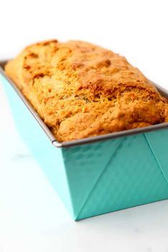 a loaf of bread in a blue container