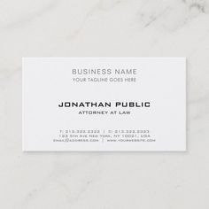 a white business card with the words, business name on it