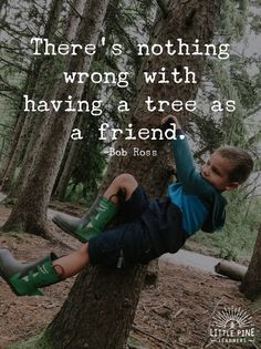 a young boy sitting on top of a tree in the woods with a quote above it that reads, there's nothing wrong with having a tree as a friend