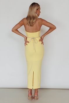 The Diamonds Midi Dress features a strapless neckline with a waist cut out and diamante strap detailing. It has a zipper in the back and is made from stretchy fabric. Runs true to size Model is 5'7" and wears a size XSMALL Center back zipper Designed in Australia Our boutique is located in Michigan USA, please visit us on instagram to see our beautiful customer's pictures. Acler Dress, Yellow Bridesmaids, Yellow Midi Dress, Blue Bridesmaids, Dress Yellow, Iron Material, Date Night Dresses, Clothing Tags, Dress Satin