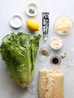 lettuce and other ingredients laid out on a table