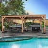 an outdoor dining area next to a swimming pool and covered patio with table and chairs