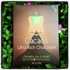 a box of cacacos ultra rich chocolate sitting on top of some green leaves