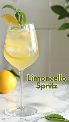 a lemonade spritz is garnished with mint