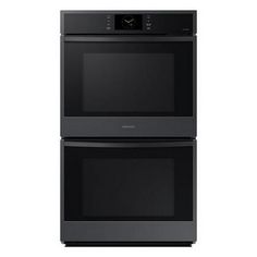 two black ovens side by side against a white background