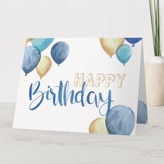 a birthday card with watercolor balloons and the words happy birthday written in blue ink