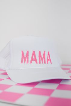 Be a stylish mama on the go with our MAMA embroidered trucker hat! This pink and white adjustable hat is perfect for any busy mom, adding a touch of fun and flair to their outfit. Stay cool and fashionable while representing motherhood with our MAMA hat. Product Details: adjustable foam terry material lining comfortable Personalized Casual Trucker Hat For Summer, Personalized Pink Snapback Trucker Hat, Summer White Trucker Hat With Embroidered Logo, White Embroidered Logo Trucker Hat For Summer, White Embroidered Trucker Hat For Summer, White Trucker Hat With Embroidered Logo For Spring, Pink Trucker Hat With Embroidered Logo, Personalized White Trucker Hat With Curved Brim, Personalized White Curved Brim Trucker Hat