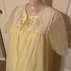 This Is A Beautiful Two Piece Set, Including Both The Night Gown And Robe. Vintage Vanity Fair Night Gown Set Most Likely From The 50’s/60’s. It Is In Wonderful Condition With No Damage. It Is A Beautiful Light Yellow Color With White Lace Around The Top And Bottom Of Both The Nightgown And The Robe. Tricot All Nylon. Made In The Usa. Size Small. Please Feel Free To Ask Me Any Questions Light Yellow Color, Vintage Vanity Fair, Vintage Vanity, Two Piece Set, Beautiful Lights, Vanity Fair, Light Yellow, Yellow Color, Night Gown