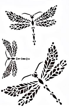 three dragon silhouettes are shown in black and white, each with different designs on it