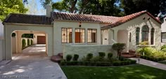 a house with a driveway in front of it