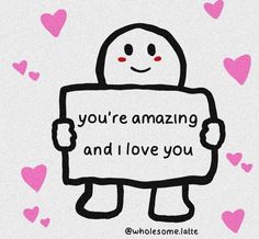 someone holding a sign that says you're amazing and i love you with hearts around it