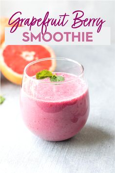 grapefruit berry smoothie in a glass with mint garnish