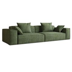 a green couch with four pillows on it and one arm folded back to the side