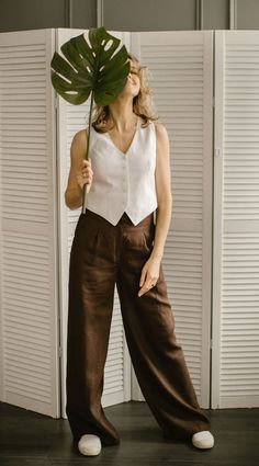 "ETHICALLY MADE. Every linen palazzo pants-waistcoat set is handmade using the body measurements of the individual customer. No factory use. Every creative and sewing task is fairly rewarded. Color in the picture- chocolate. Other colors are available. DESCRIPTION: Linen waistcoat: -Sleeveless -Slim fit -All button down -Two linen layers -Handcrafted Linen Pants: -Wide leg -Two front pockets -Two back pockets -Wide waist line -Zipper -Handcrafted Material: 100 % softened Lithuanian linen, medium Brown Linen Pants Outfit, Linen Trousers Outfit, Linen Suits Women, Vest Linen, Linen Palazzo Pants, Brown Linen Pants, Linen Waistcoat, Flax Clothing, Linen Wedding Dress