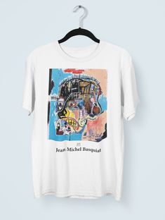 Hi guys, Thank you for stopping by my shop. If you have any questions or need anything please feel free to reach out! Best, Aly :) A Jean-Michel Basquiat print shirt. Basquiat Shirt, Jean Michel Basquiat Print, Pop Art Shirt, Artsy Shirt, Abstract Shirt,Aesthetic Shirt,Graphic Shirts, 90s Shirts PLEASE NOTE that colors might vary due to lighting conditions and monitor/device resolutions. :) Unisex Jersey Short Sleeve Tee- - 100% Airlume combed and ringspun cotton (fiber content may vary for diff Artsy Graphic Tees, Artsy Letter Print Tops For Streetwear, Artsy Short Sleeve Shirt With Graphic Design, Artsy Custom Print T-shirt For Streetwear, Custom Artwork Short Sleeve Shirt For Streetwear, Streetwear Short Sleeve Shirt With Custom Artwork, Artistic T-shirt With Funny Print For Streetwear, Artistic Funny Print T-shirt For Streetwear, Artistic Graphic Shirt For Streetwear