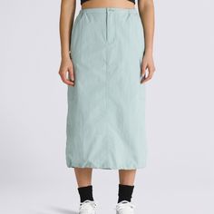 Made to move, the Riley Parachute Cargo Skirt is a roomy skirt with a fitted waist, cargo pockets with flap closures, and stylish bungee details with a drawstring hem. 100% Nylon fabric Cargo pocket with flap closure Bungee details | Vans Riley Parachute Cargo Skirt Womens XS Casual Vans Bottoms With Pockets, Casual Nylon Skirt For Spring, Loose Fit Nylon Casual Skirt, Casual Nylon Skirt With Relaxed Fit, Casual Nylon Skirt With Elastic Waistband, Casual Relaxed Nylon Skirt, Utility Mini Skirt With Side Pockets, Utility Skirt With Side Pockets For Spring, Spring Utility Skirt With Side Pockets