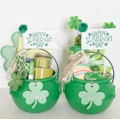 two st patrick's day baskets with shamrocks on them