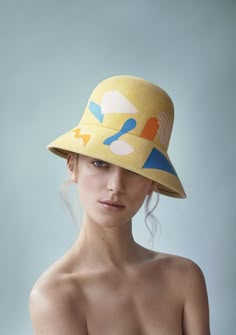 Inspired by the colors of bright Mexican doorways and Henri Matisse, British milliner Laura Apsit Livens has designed a most playful and colorful collection of cloches, berets, trilbys and boaters for fall - and quite honestly, it's her best collection yet. The London College of Fashion alumna