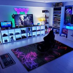 a living room filled with lots of furniture and electronics