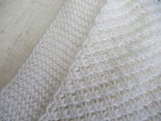 closeup of white knitted material on the surface