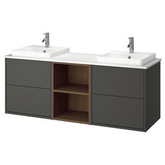 two sinks are shown on the side of a gray cabinet with white counter tops and drawers