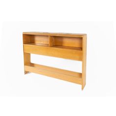 a wooden shelf with two open shelves on it's sides, against a white background