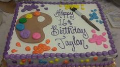 a birthday cake that is decorated with colorful icing