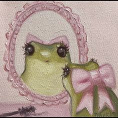 a painting of a frog looking at its reflection in a mirror with a pink bow