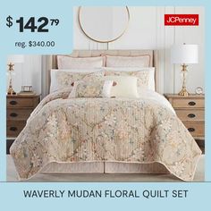 a bed with floral comforter and pillows on it for $ 124 99 reg $ 340 00