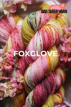 colorful skeins of yarn with the words foxglovee written on them