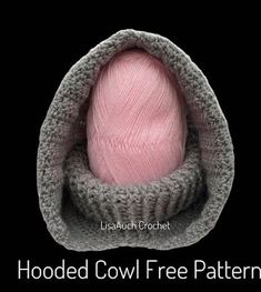 a pink ball of yarn in a gray knitted bag text reads hooded cowl free pattern