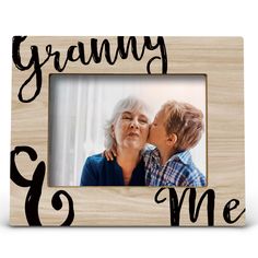 a wooden frame with the words granny and me in black lettering on it, next to an older woman's face