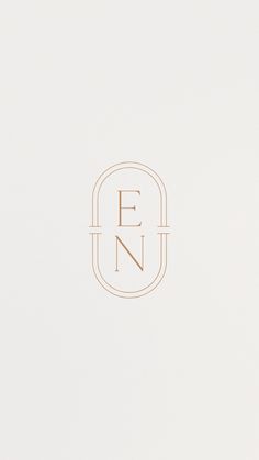 the e n logo is shown in gold on a white background with an orange border