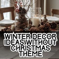 a dining room table with pine cones and candles on it, surrounded by christmas decorations