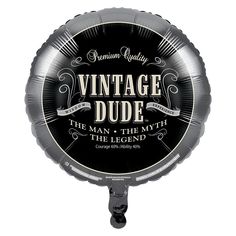 an old - fashioned tin with the words vintage dude on it, in black and gold