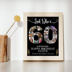 a 50th birthday card with the number sixty and pictures on it next to a vase