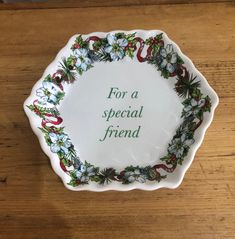 a white plate that says for a special friend on it