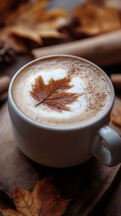 a cappuccino with a maple leaf on it