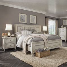 a bedroom scene with focus on the bed and dresser