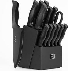 a black knife holder with eight knives in it