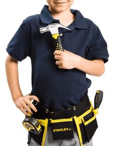 a young boy holding a hammer and tool belt