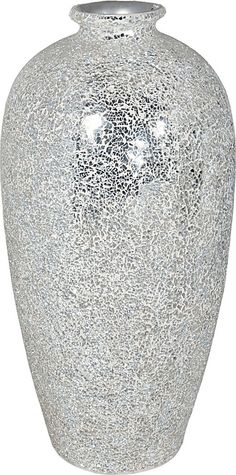 a white vase with silver speckles on the bottom is shown in front of a white background