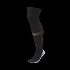 a pair of black socks on a black background